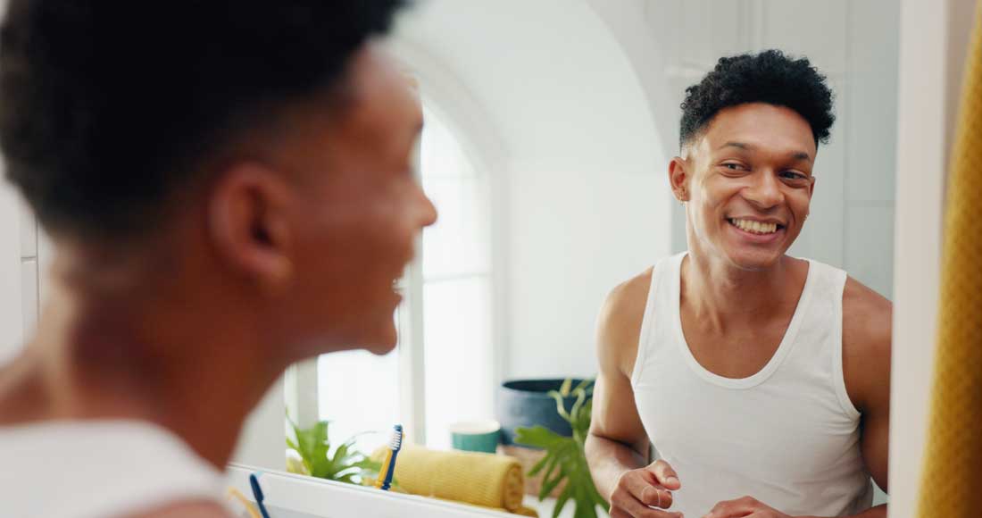 Man showing refreshed skin after DiamondGlow® facial