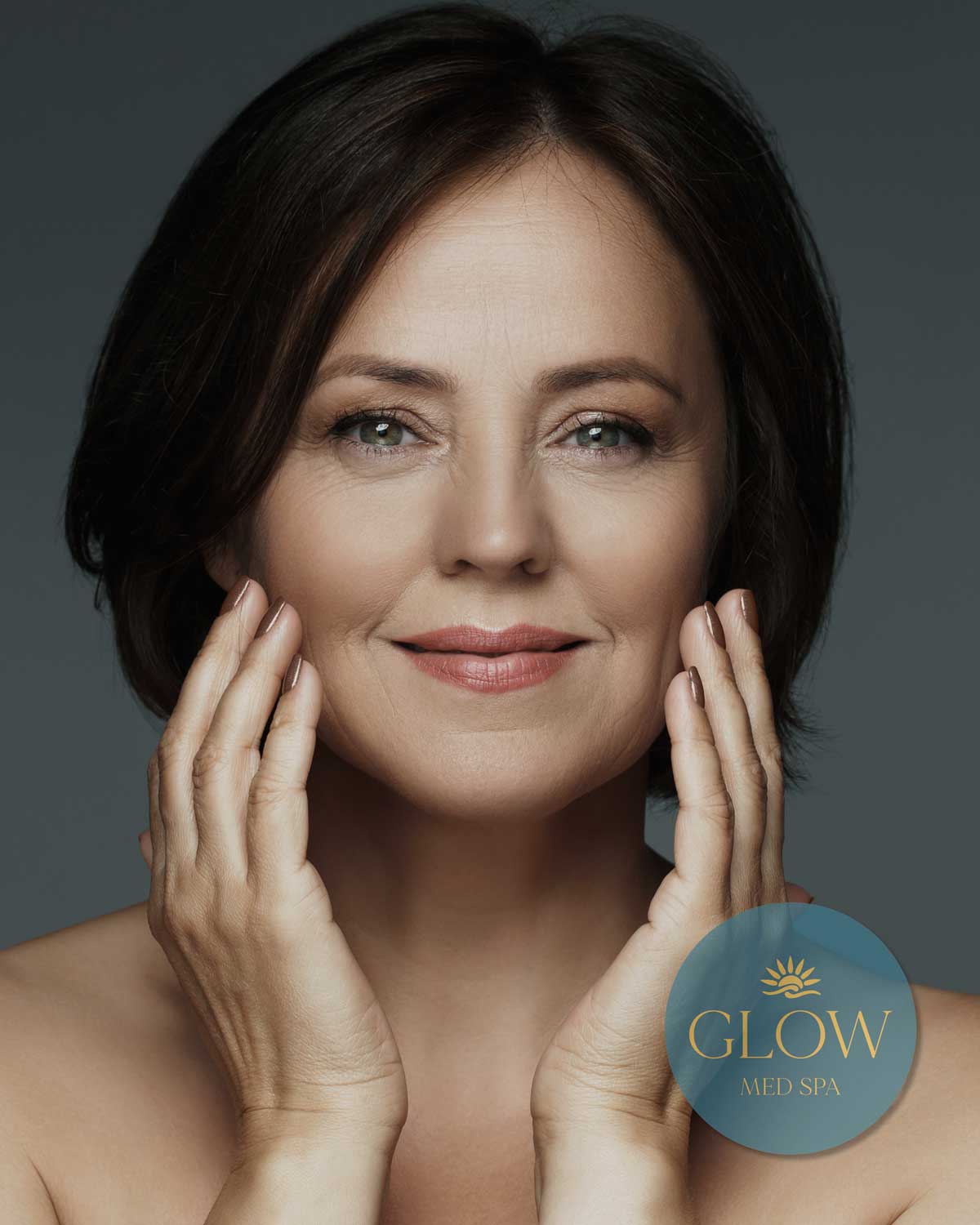 Smiling woman enjoying personalized aesthetic care at Glow Med Spa